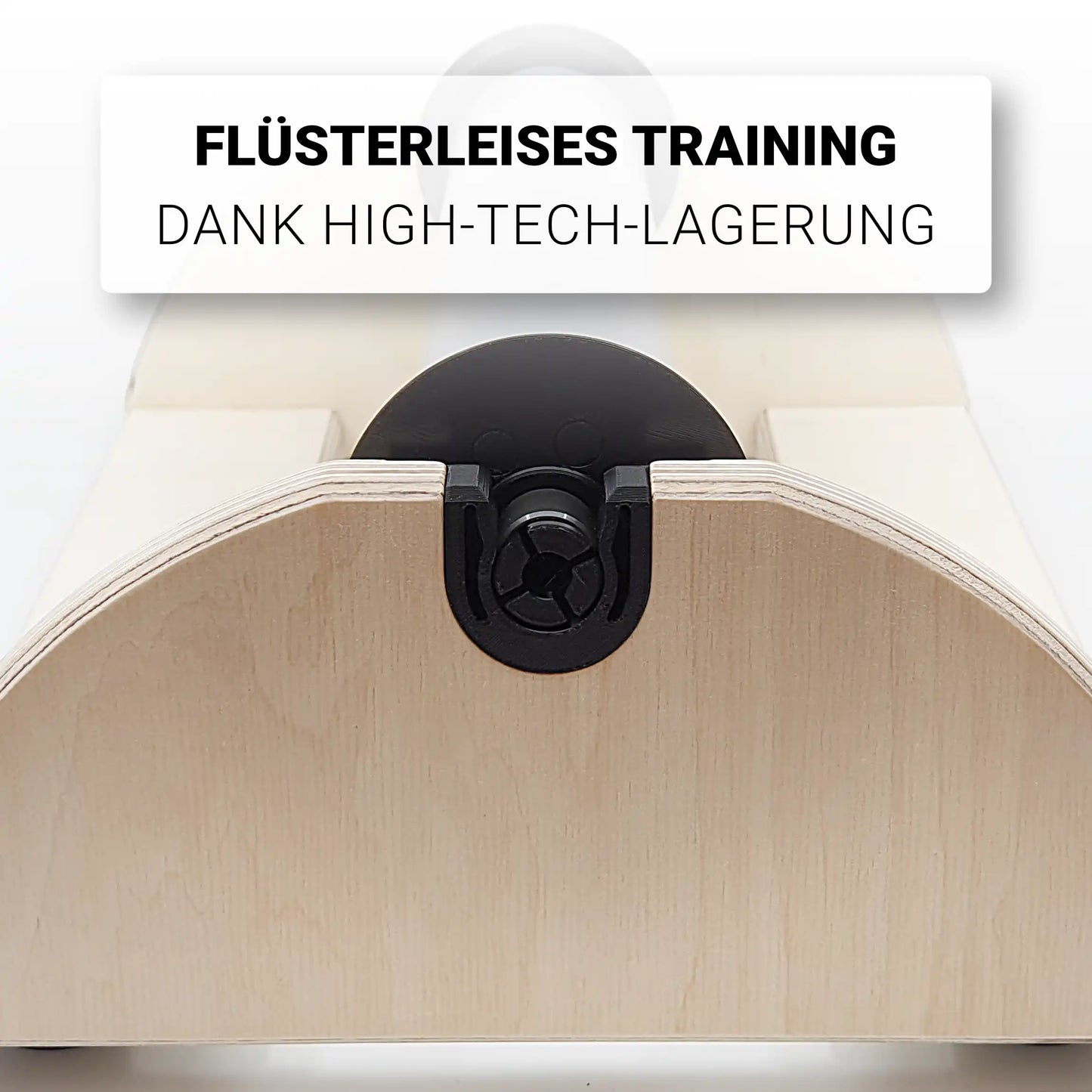 Detailaufnahme der Drehachs-Lagerschale des SmartRollers: Passgenaue Führung für 50mm Blackroll-Kerne in einer robusten Halterung aus Multiplex Birke für flüssige Rotationsbewegungen.