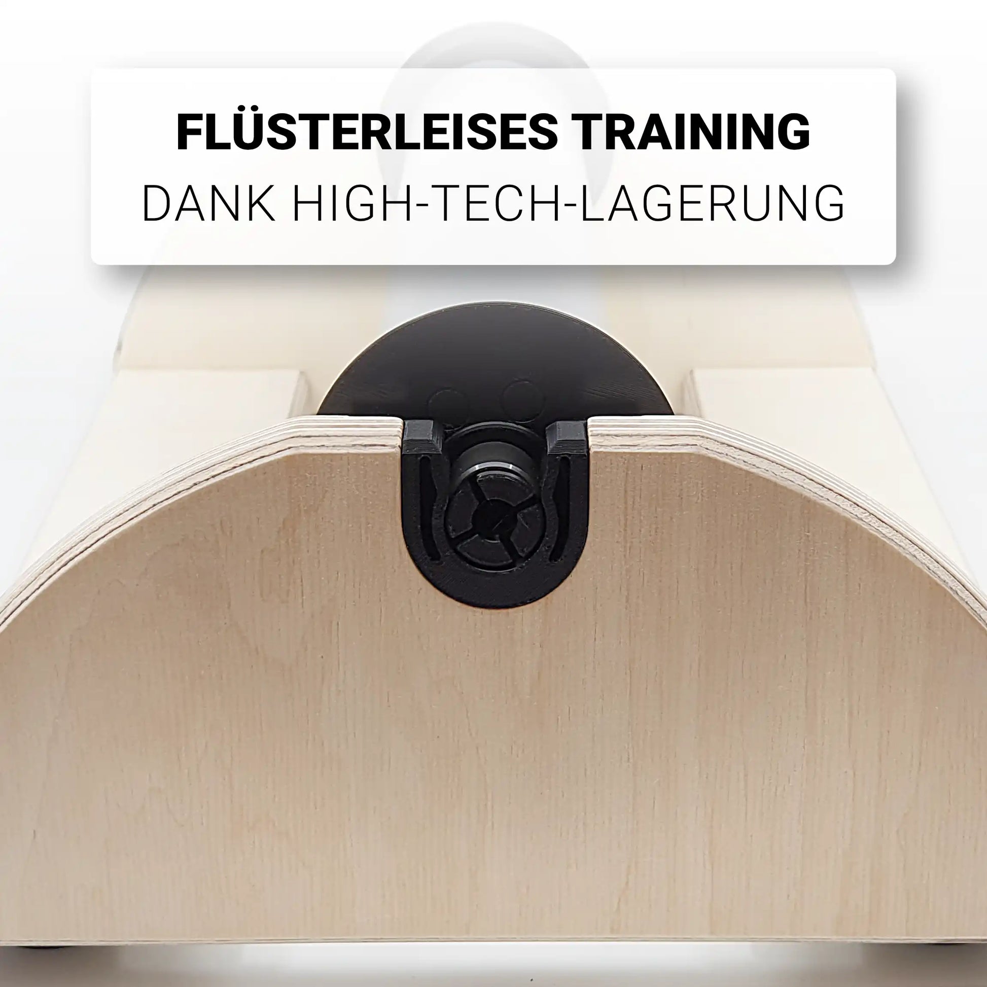 Detailaufnahme der Drehachs-Lagerschale des SmartRollers: Passgenaue Führung für 50mm Blackroll-Kerne in einer robusten Halterung aus Multiplex Birke für flüssige Rotationsbewegungen.